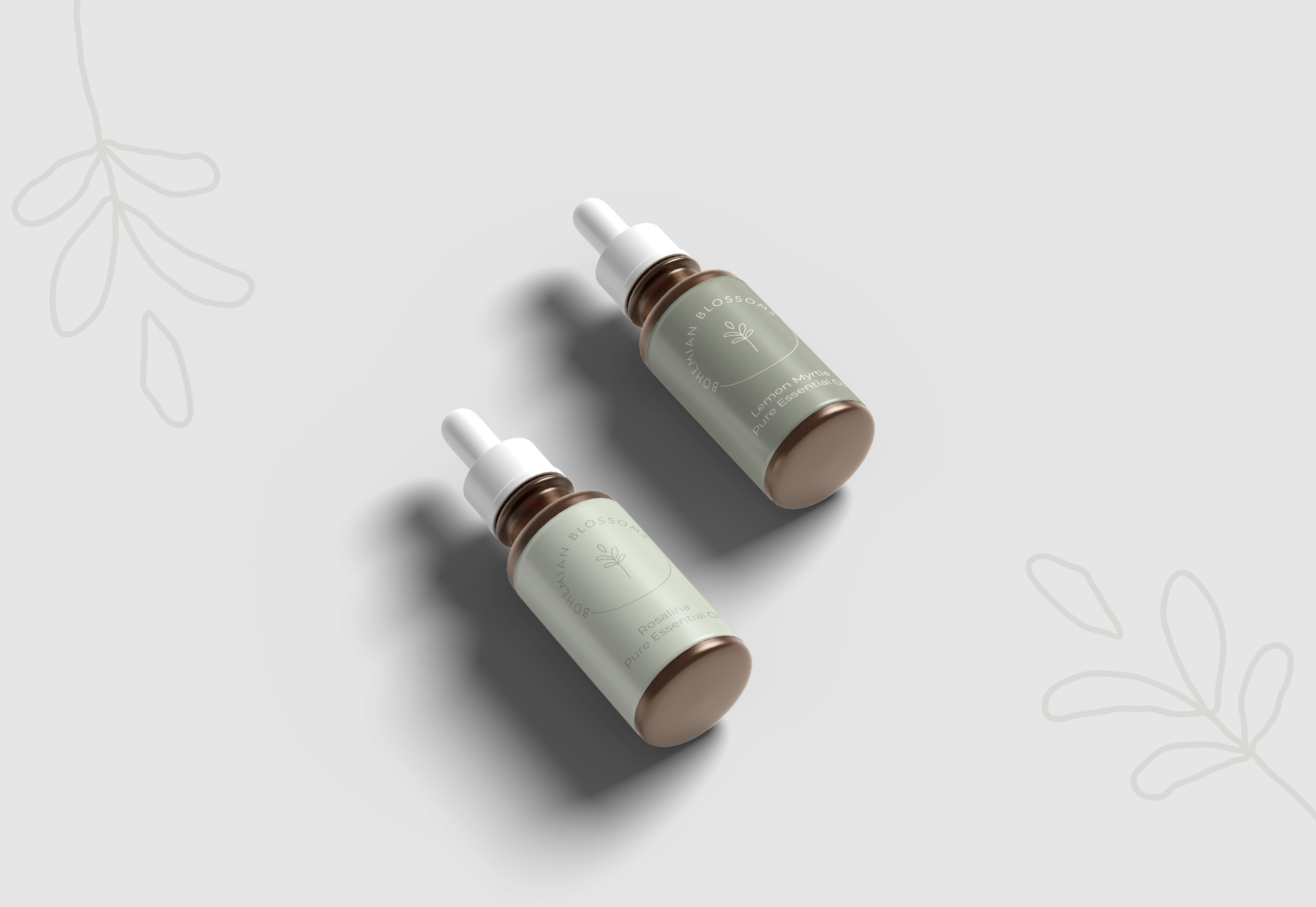 Two essential oil dropper bottles with sage labels and the circular lockup